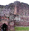 Carlisle castle seen from the south. The Norman keep is behind the Norman and later medieval gatehouse and curtain wall.