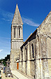 Struttura muraria in pietra di Caen, campanile della chiesa parrocchiale di San Lupo (Saint-Loup-Hors, Bayeux)