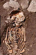 Sepoltura di bambino, cimitero Notre-Dame-de-Cherbourg, XIImo sec.